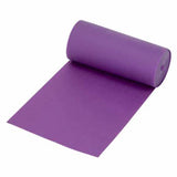 Purple exercise resistance band roll for physical therapy or rehabilitation