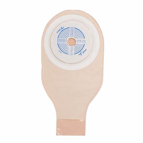 Beige medical ostomy pouch with adhesive barrier for stoma care support.