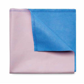 Absorbent medical underpad with blue waterproof backing, folded on white background