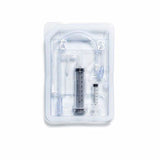 Sterile medical supply kit with syringes and tubing in clear plastic packaging