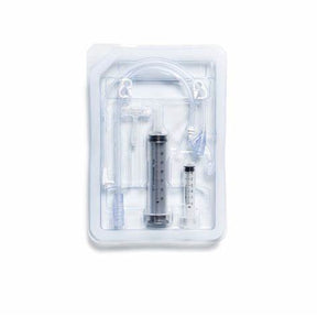 Sterile medical supply kit with syringes and tubing in clear plastic packaging