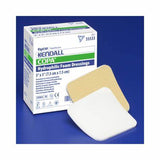 Kendall Copa hydrophilic foam dressings, 3x3 inch, two dressings and product box on blue background