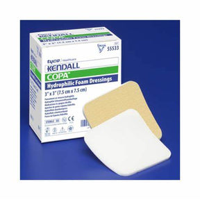 Kendall Copa hydrophilic foam dressings, 3x3 inch, two dressings and product box on blue background