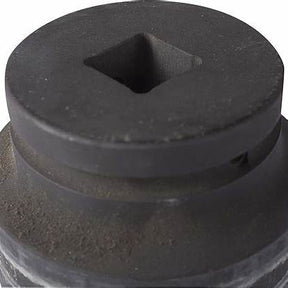 Close-up of a metal socket adapter with a square drive, used for medical equipment assembly