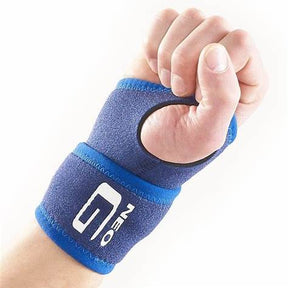 Blue wrist support brace on hand, medical orthopedic wristband for joint pain relief