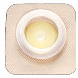 Ostomy barrier ring adhesive pad with central opening for medical bag attachment