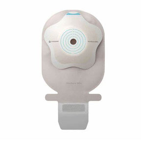 Ostomy bag with skin barrier, medical adhesive, and drainable pouch on white background