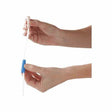 Hands using a white medical catheter with a blue grip designed for home healthcare needs