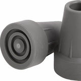 Close-up of two gray rubber cane tips for mobility aids on a white background