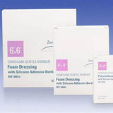 Foam dressing boxes with silicone adhesive border in various sizes on blue background