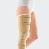 Medical compression wrap on upper leg and thigh for lymphedema or swelling relief