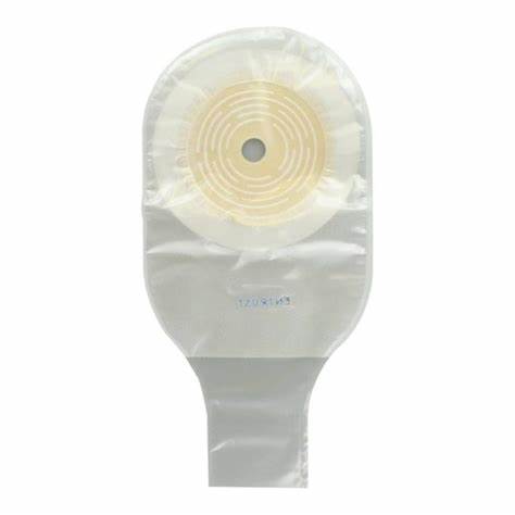 Transparent medical ostomy bag with adhesive barrier for stoma care on white background