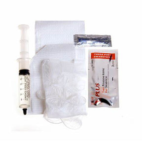 Medical syringe, gauze pads, gloves, and antiseptic swabs for home medical care kit