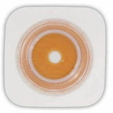 Hydrocolloid ostomy barrier with adhesive ring for stoma care on white background