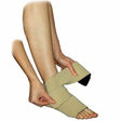 Person applying beige compression ankle wrap for foot and ankle support