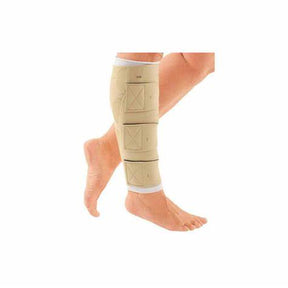 Compression leg wrap for lymphedema or edema, shown on lower leg, medical supply product.