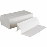 Folded white paper hand towels, stacked, with one towel partially unfolded
