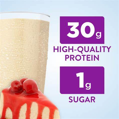 Protein shake with cherry cheesecake, 30g protein and 1g sugar highlighted on label.