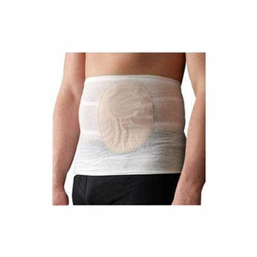 Person wearing an ostomy support belt over a stoma bag for medical care