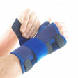 Person wearing adjustable blue wrist support brace for hand and wrist pain relief