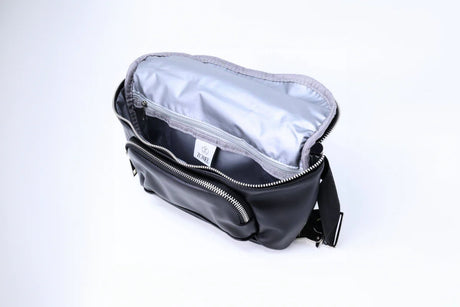 Black crossbody bag with open top, zippered pockets, and insulated interior lining